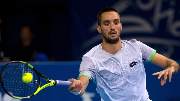 Serbia's Viktor Troicki returns the ball to Spain's Roberto Bautista during the final tennis match at the ATP World Tour Sofia Open on February 7, 2016