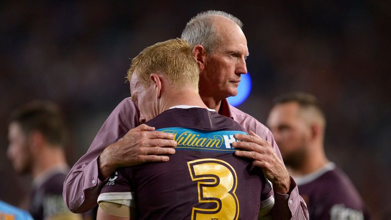 Wayne Bennett, Coach of the Broncos hugs Jack Reed after defeat during the 2015 NRL Grand Final match between the Brisbane Broncos and the Rabbitohs