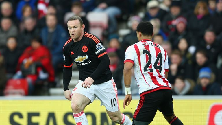  Wayne Rooney of Manchester United controls the ball under pressure of DeAndre Yedlin of Sunderland
