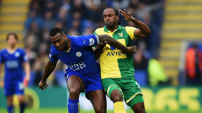  Wes Morgan of Leicester City and Cameron Jerome of Norwich City
