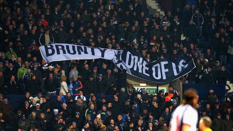 West Bromwich Albion fans hold a banner to show their support for Chris Brunt 
