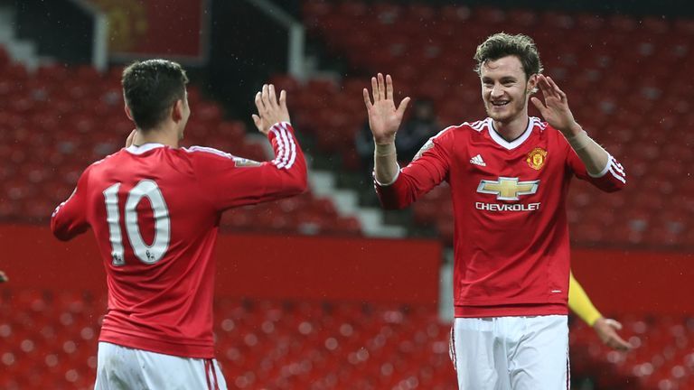 Will Keane of Manchester United U21s (R) celebrates scoring his second goal with Andreas Pereira
