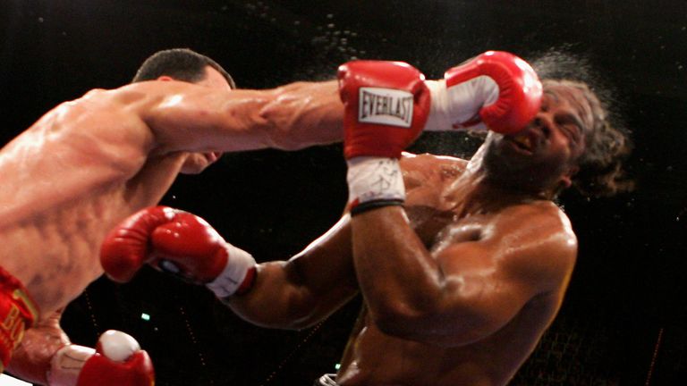 Wladimir Klitschko (L) of Ukraine hits Chris Byrd (R) of the USA during their IBF and vacant IBO World Heavyweight Champions