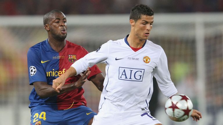 ROME, ITALY - MAY 27: Cristiano Ronaldo of Manchester United clashes with Yaya Toure of Barcelona during the UEFA Champions League Final May 27 2009
