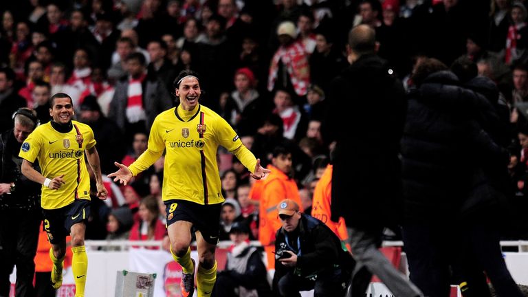 Zlatan Ibrahimovic of Barcelona celebrates as he runs towards Pep Guardiola after scoring at Arsenal in the Champions League in March 2010 at the Emirates