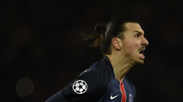 Paris Saint-Germain's Swedish forward Zlatan Ibrahimovic celebrates after scoring a goal during the Champions 