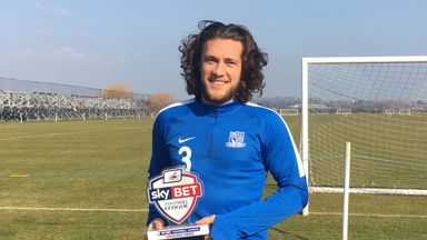 Image of Ben Coke with his Sky Bet Football League Unsung Hero award