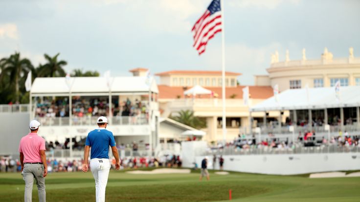 DORAL, FL - MARCH 04:  Adam Scott of Australia and Dustin Johnson walk up the 18th hole during the second round of the World Golf Championships-Cadillac Ch