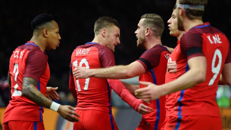 Jamie Vardy (2nd L) of England celebrates scoring his team's second goal 