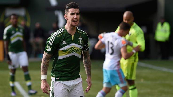 Liam Ridgewell #24 of Portland Timbers has some words with the side judge during the second half of the game against the Columbus C