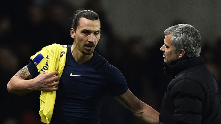 Paris Saint-Germain's Swedish midfielder Zlatan Ibrahimovic speaks with Chelsea's Portuguese manager Jose Mourinho (R)