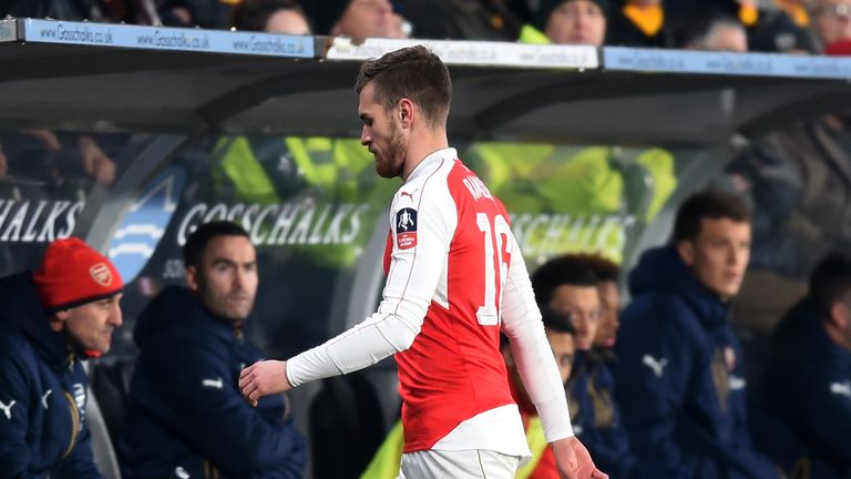 Aaron Ramsey leaves the field with injury