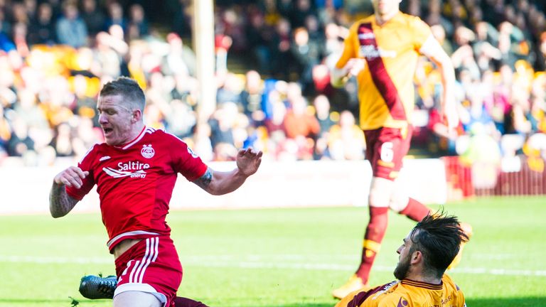 Kieran Kennedy tackles Aberdeen's Jonny Hayes and concedes a penalty