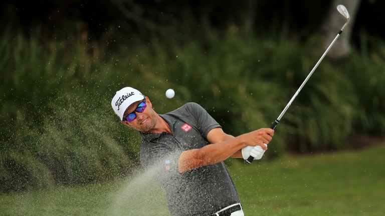 Adam Scott of Australia out of the bunker on the 13th hole during the third round of the World Golf Championships-Cadillac Championship