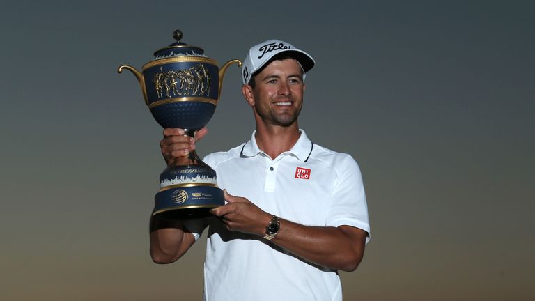 Adam Scott with the WGC-Cadillac Championship trophy