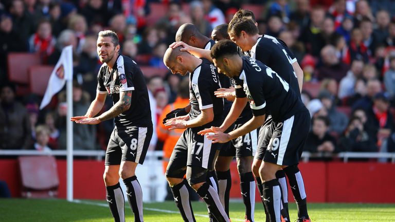 Adlene Guedioura of Watford (17) celebrates with team-mates after his superb goal