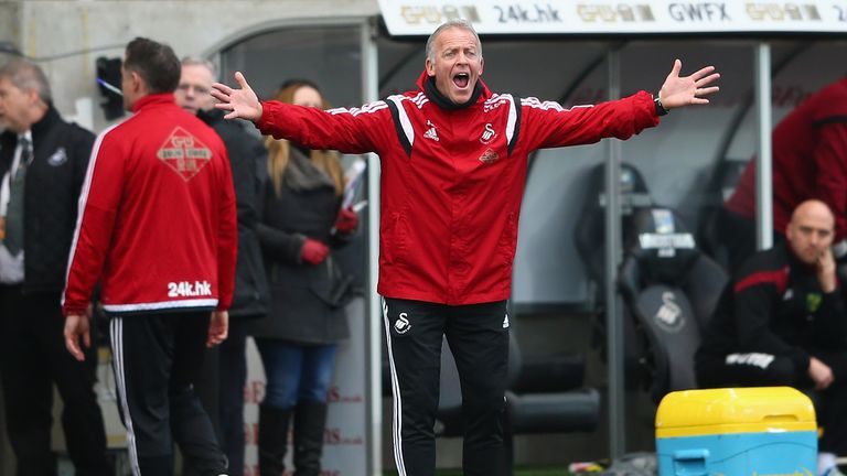 Assistant coach of Swansea Alan Curtis gestures during the Barclays Premier League match between Swansea City and Norwich City a