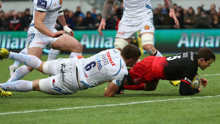 LONDON, ENGLAND - MARCH 26: Alex Goode of Saracens scores a try during the Aviva Premiership match between Saracens and Exeter Chiefs at Allianz Park on Ma