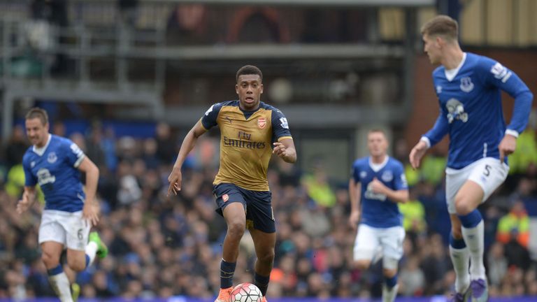 Arsenal striker Alex Iwobi runs with the ball during the Premier League football match at Everton