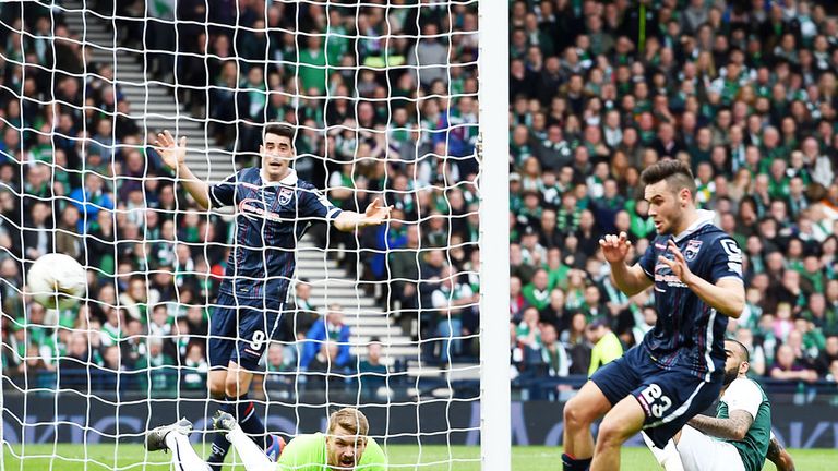 Alex Schalk (R) scores the winning goal for Ross County against Hibernian 