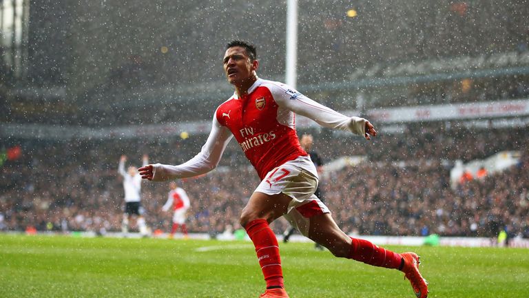 Alexis Sanchez of Arsenal celebrates scoring his team's second goal 