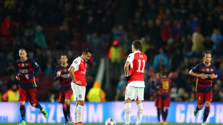 Alexis Sanchez and Mesut Ozil show their dejection