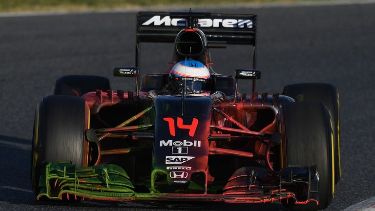 Alonso's car was covered in aero paint for his late run 
