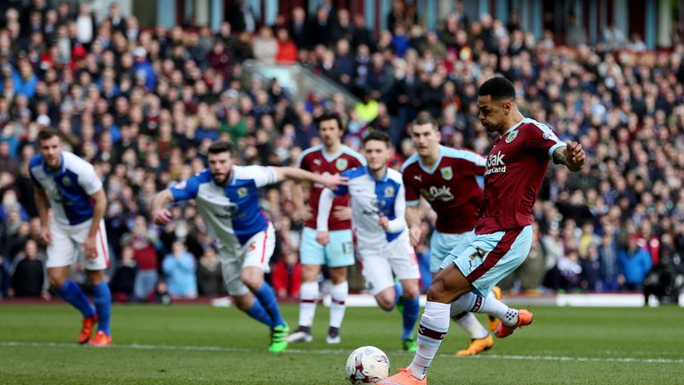 Burnley's Andre Gray scores his side's first goal of the game from the penalty spot 
