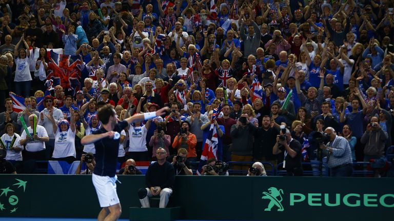 Andy Murray of Great Britain throws his sweatbands into the crowd after Davis Cup win over Japan in Birmingham