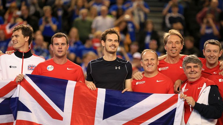 Great Britain's Andy Murray celebrates with his team-mates and coaching staff 