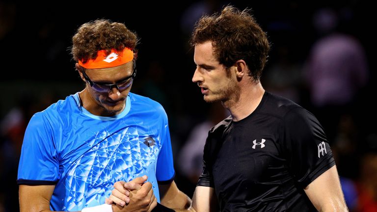 Murray in congratulated by Denis Istomin after the match