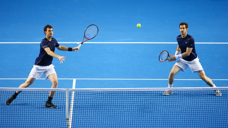 BIRMINGHAM, ENGLAND - MARCH 05:  Jamie Murray and Andy Murray of Great Britain in action during the doubles match against Yoshihito Nishioka and Yasutaka U