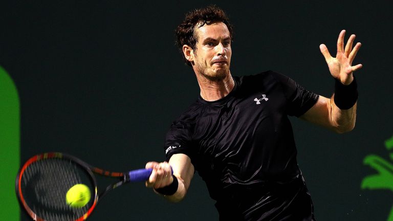 Andy Murray of Great Britain plays a forehand