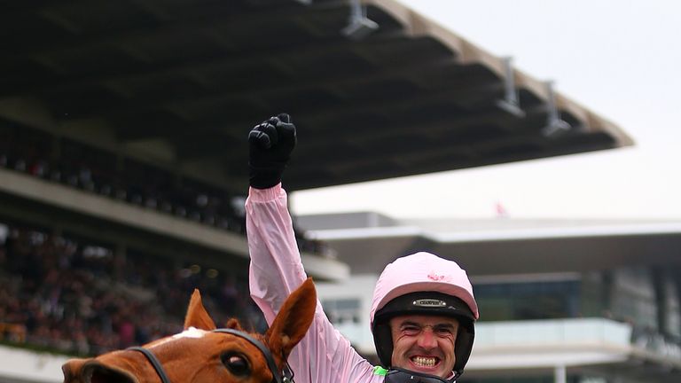 CHELTENHAM, ENGLAND - MARCH 15:  Ruby Walsh celebrates after riding Annie Power to victory in the Stan James Champion Hurdle Challenge Trophy Race on day o