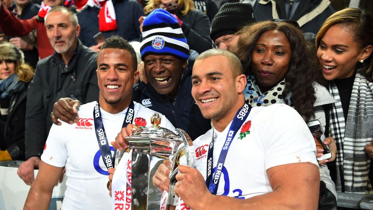 Anthony Watson and Jonathan Joseph of England celebrate with the Six Nations trophy 