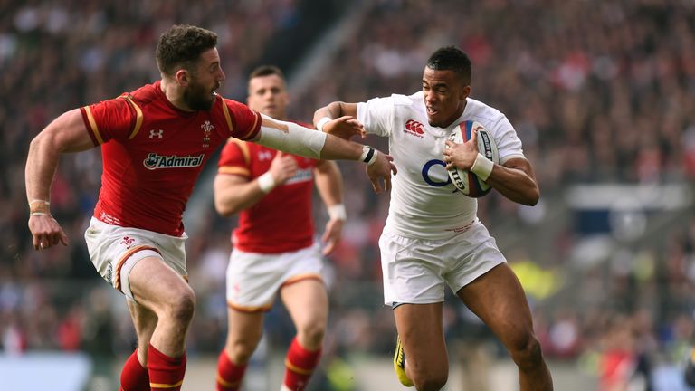 Anthony Watson fends off Alex Cuthbert