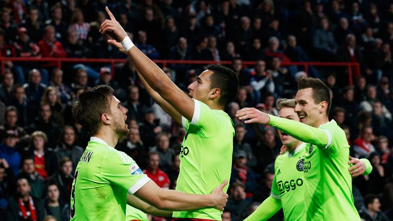 Anwar El Ghazi of Ajax celebrates scoring his teams second goal of the game with team mates during the Eredivisie match between PSV Eindhoven and Ajax