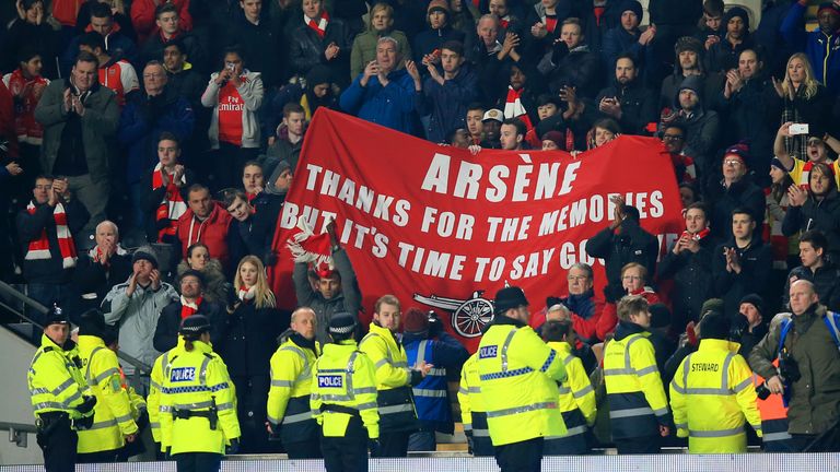 A banner calling for Arsene Wenger to go is held up during Arsenal's FA Cup win at Hull