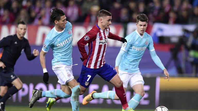 Antoine Griezmann (centre) tries to get away from Hector Moreno and Marco van Ginkel
