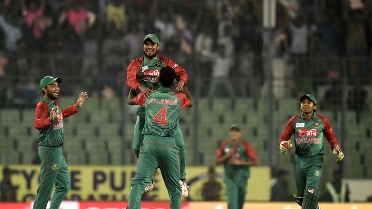 Bangladesh cricketers react after the dismissal of unseen Pakistan batsman Khurram Manzoor during the Asia Cup 