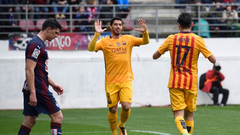 Barcelona's forward Munir El Haddadi celebrates with Luis Suarez 