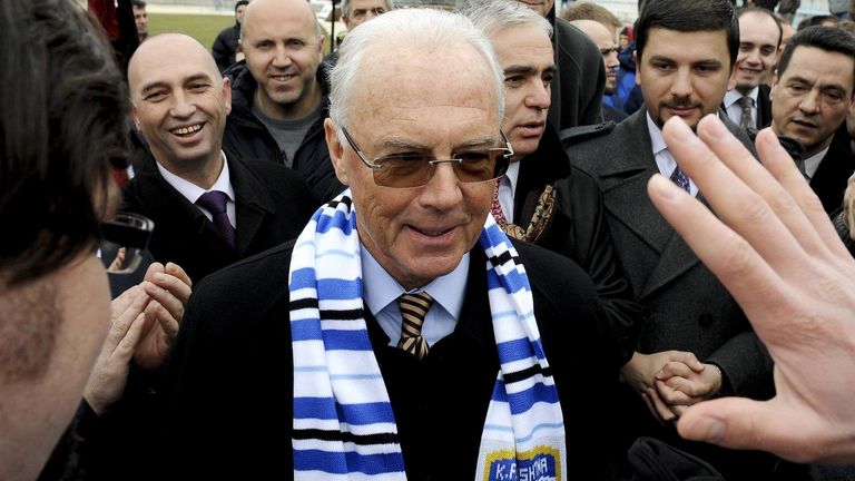 Football fans cheer on German legend Franz Beckenbauer