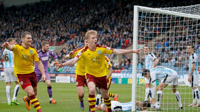 Ben Mee (right) celebrates scoring his side's third goal of the game 