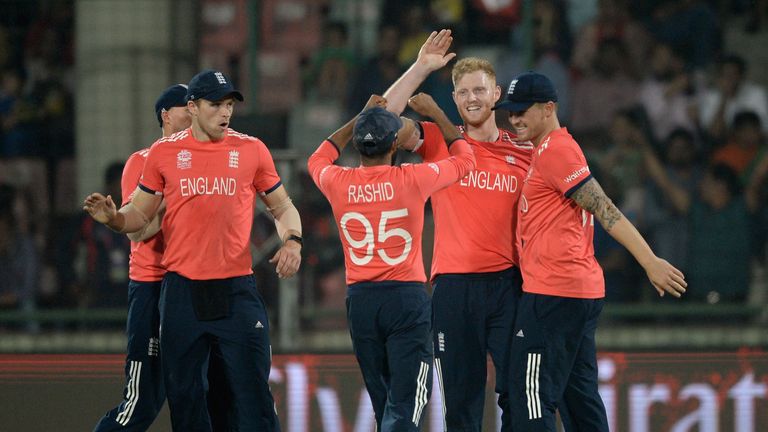 Ben Stokes celebrates with team-mates after dismissing Corey Anderson