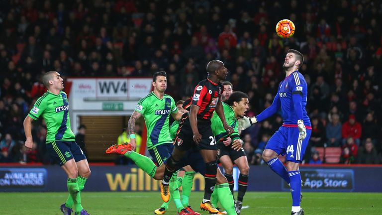 Benik Afobe heads the ball past Southampton's Fraser Forster to score Bournemouth's second goal 