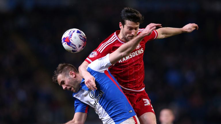 BLACKBURN, ENGLAND - MARCH 01:  Tommy Spurr of Blackburn Rovers and David Nugent of Middlesbrough compete for the ball during the Sky Bet Championship matc