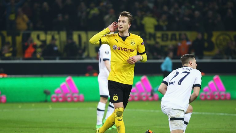 Marco Reus celebrates after scoring for Borussia Dortmund