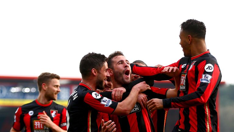 BOURNEMOUTH, ENGLAND - MARCH 12:  Steve Cook (C) of Bournemouth celebrates scoring his team's third goal with his team mates during the Barclays Premier Le
