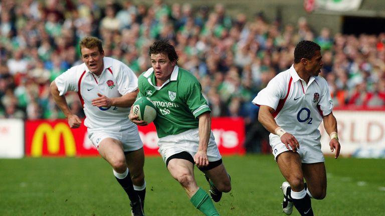 Brian O'Driscoll of Ireland splits the English defence during the RBS Six Nations Championship match between Ireland and England in Dublin, 2003.