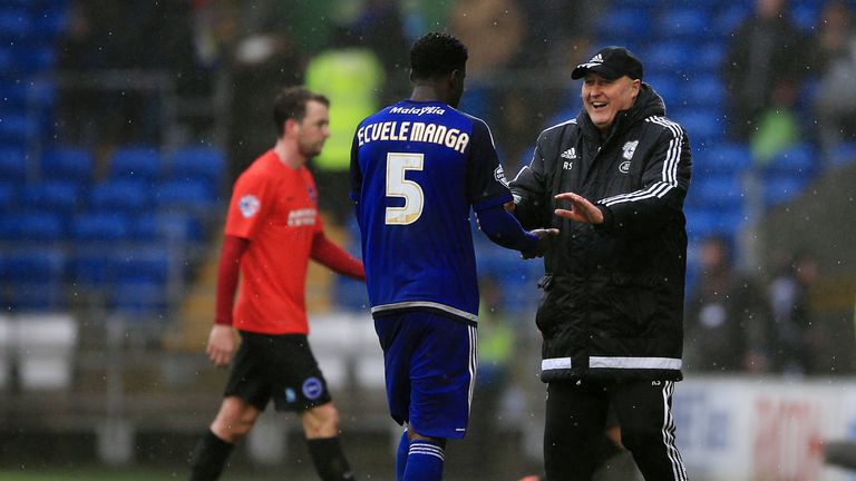 Cardiff's Bruno Ecuele Manga celebrates with manager Russell Slade 